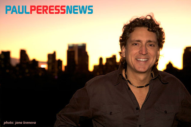 Paul Peress News... photo of Paul Peress with New York skyline in the background