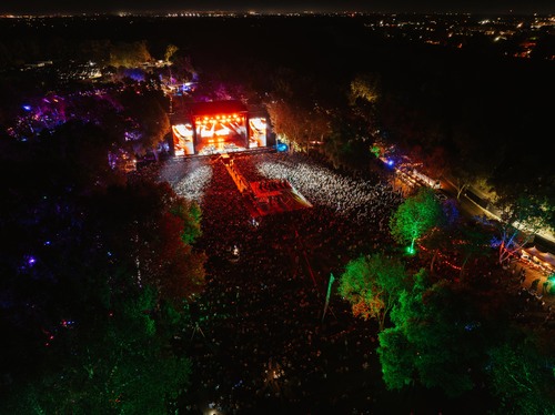 A large crowd of people at a concertDescription automatically generated