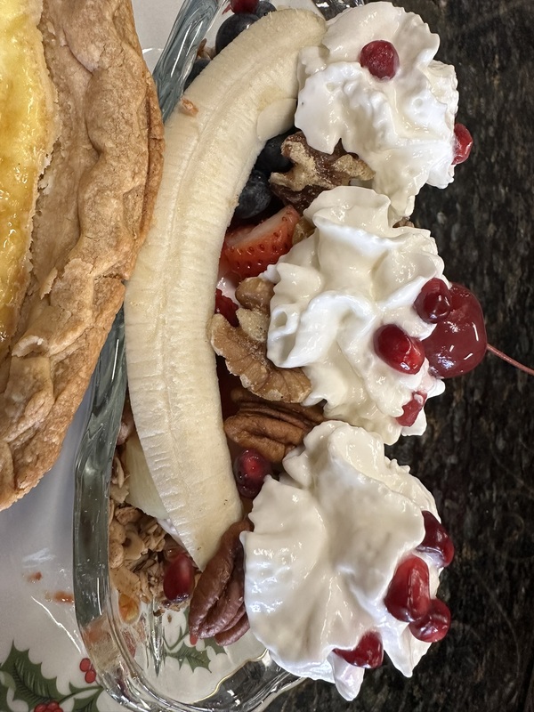 A delicious breakfast from Annville Inn, Bed and Breakfast. In this image, the table setting shows and the couple sitting at the table are all smiles! Annville Inn News.