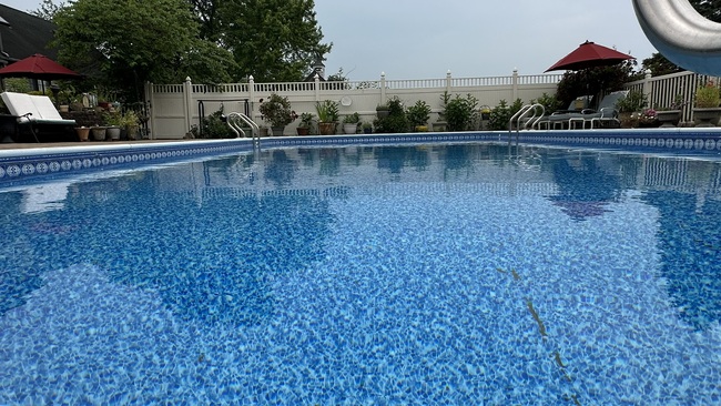 View from the water level of Annville Inn's new large swimming pool.
Crystal clear water, pool bottom and sides are a blue liner.ss with a Christian message as well as secular Easter decorations.