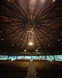 Image of the massive beams inside the outdoor open air auditorium's roof of the Mt.Gretna Tabernacle