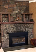 The Avenue Hotel Bed & Breakfast's rock fireplace adds an inviting atmosphere