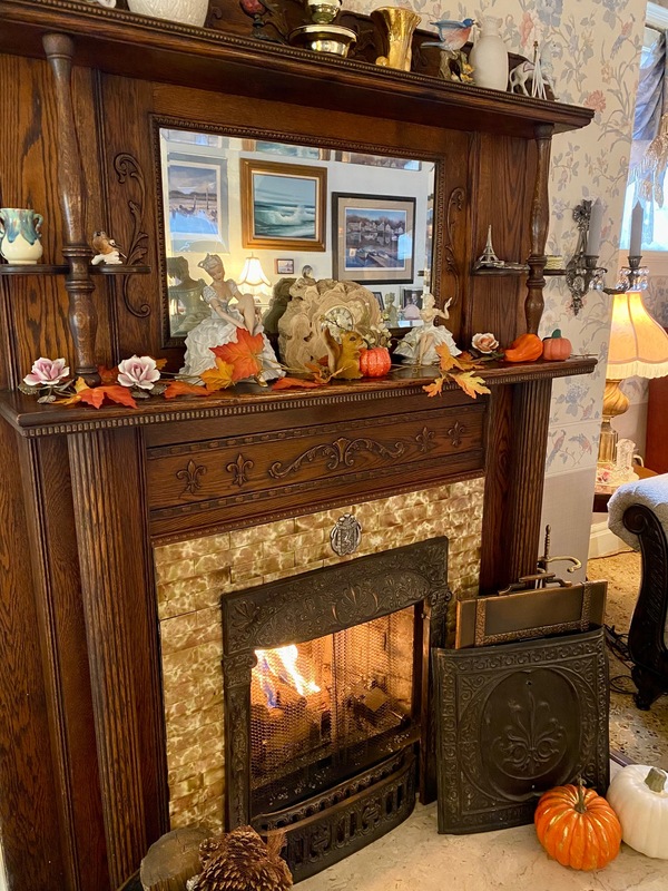 Fall is a great time to enjoy the living room fireplace at Holden House in Colorado Springs