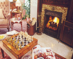 Holden House in Colorado Springs formal parlor is graced with an oak framed antique charmer