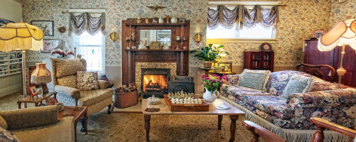 The inviting living room is the perfect place to snuggle up on a fall weather day