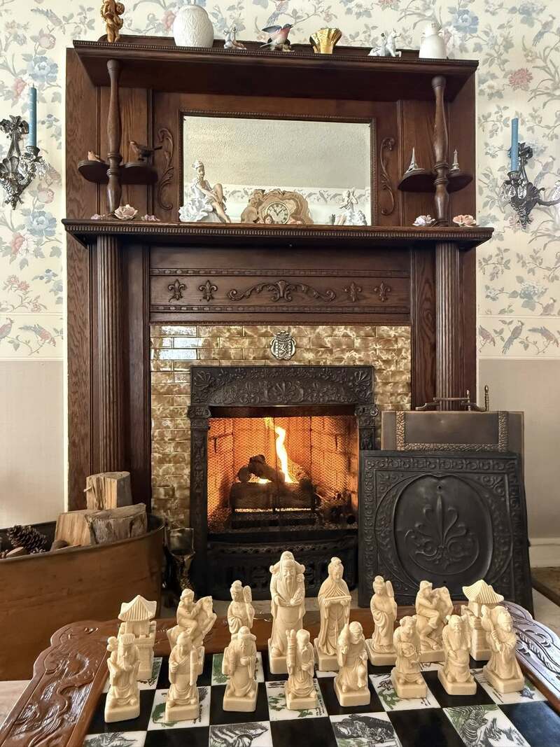 Afternoon wine social is included in your Holden House B&B stay where you can relax by the main parlor fireplace