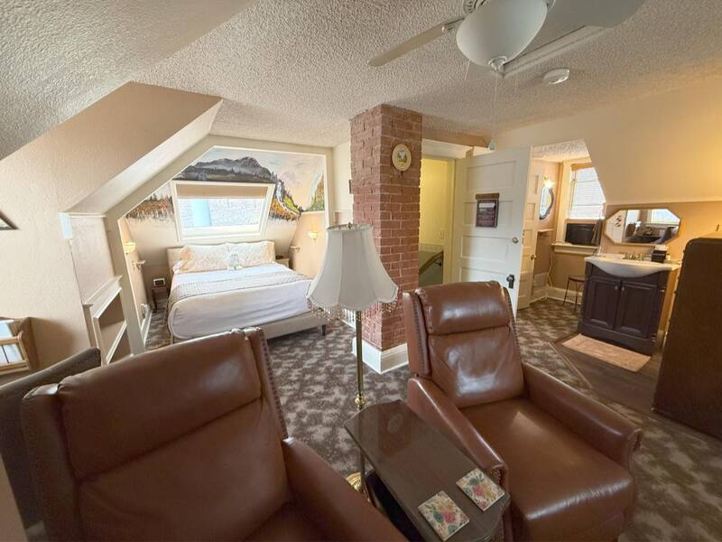 Each suite features queen or king beds and sitting areas