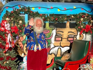 Santa Joe, Holden House' next door neighbor, brings holiday cheer to local families and kids