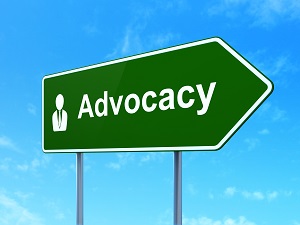 IMAGE: Green road sign. The word Advocacy is spelt out in white capital letters