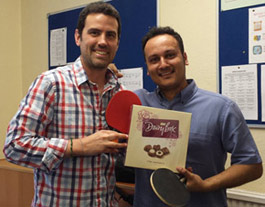 LSI London Hampstead teachers Michael Sisley and James Butcher receive the winners trophy