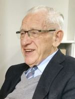 Em.-pastoor Scholten